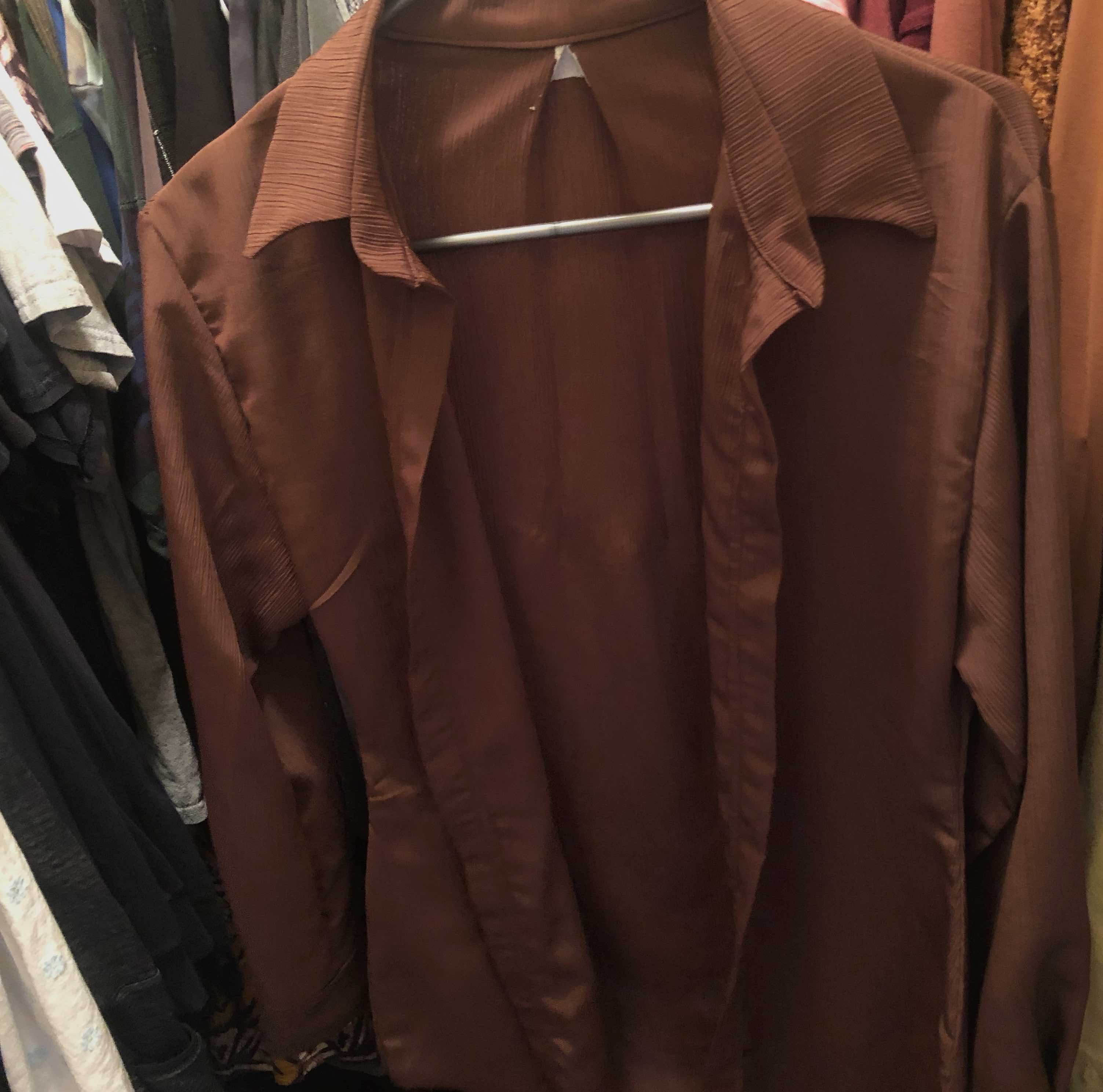 Image of brown button-up shirt.