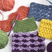 Image of crochet hook and yarn.
