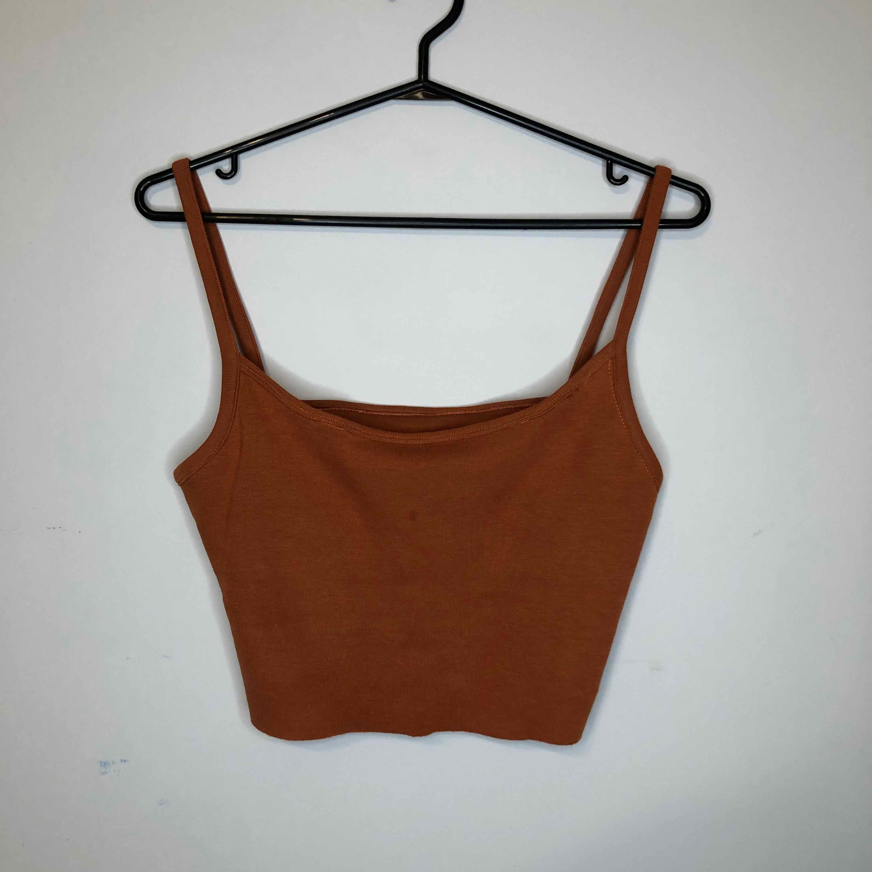 Image of orange tank.